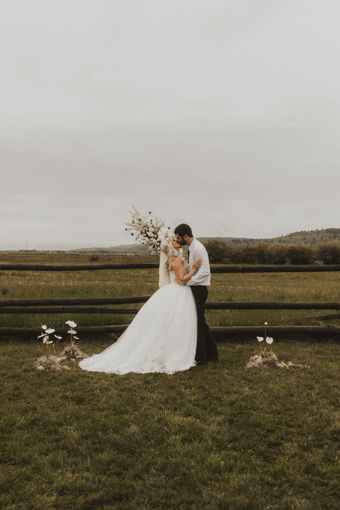 bride and groom kissing