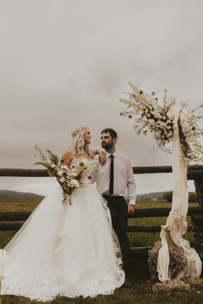 bride and groom looking at each other - western wedding 