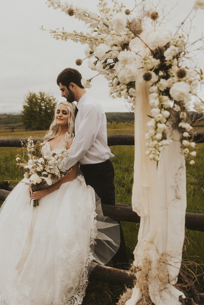 bride and groom hugging