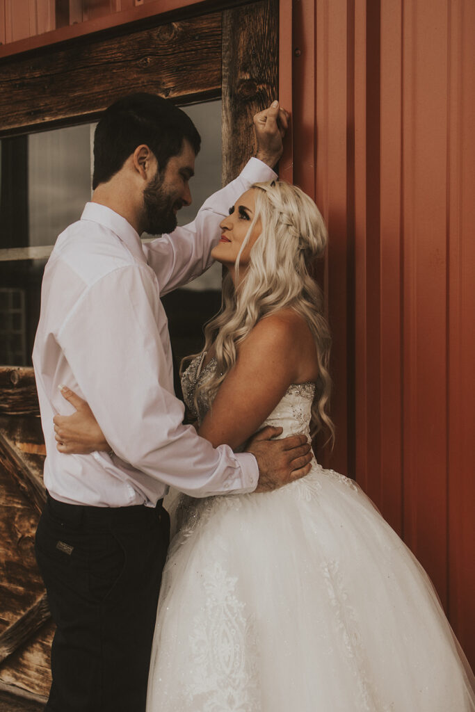 bride and groom looking at each other at their western wedding 