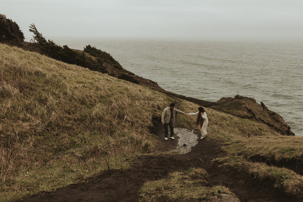 couple holding hands during their adventurous couple session