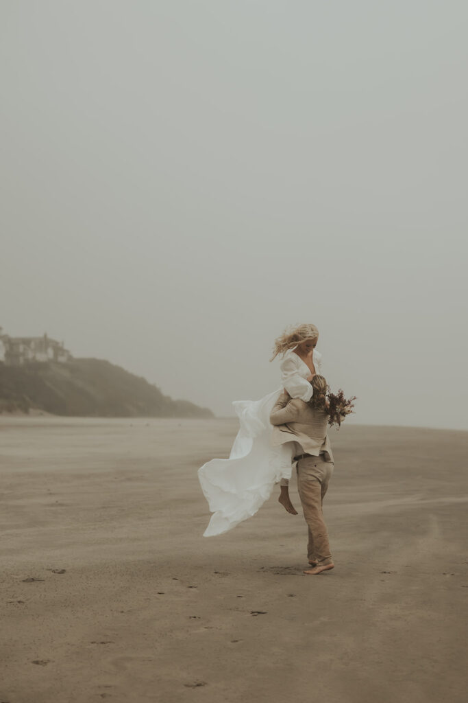 groom holding the bride 