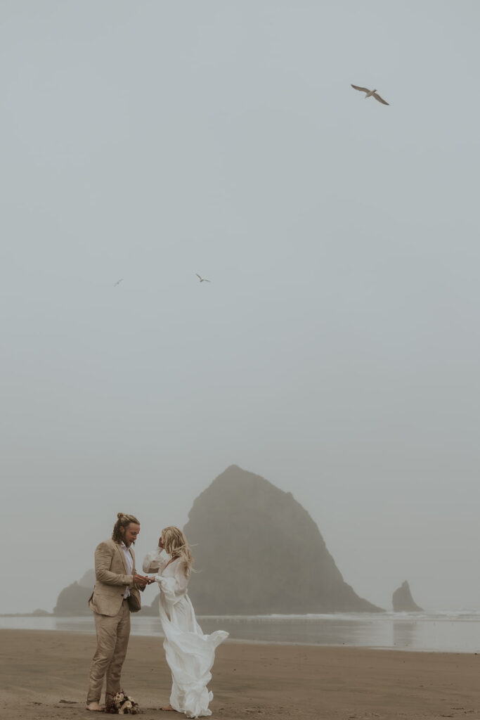 bride and groom looking at each other 