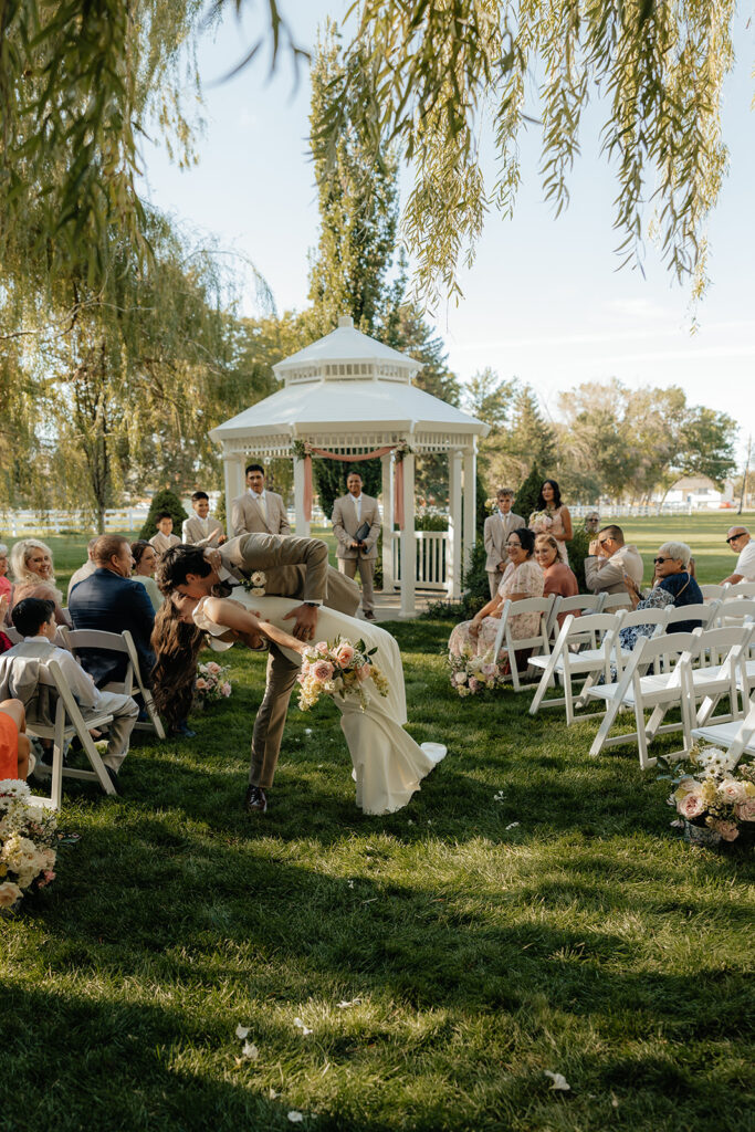 cute portrait of the newlyweds kissing 