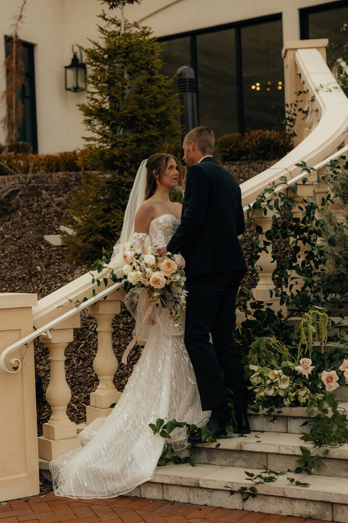 picture of the newlyweds smiling at each other