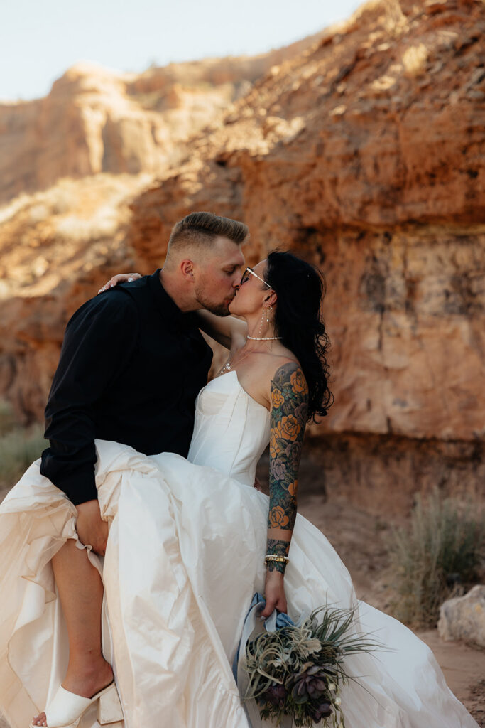 portrait of the newlyweds kissing