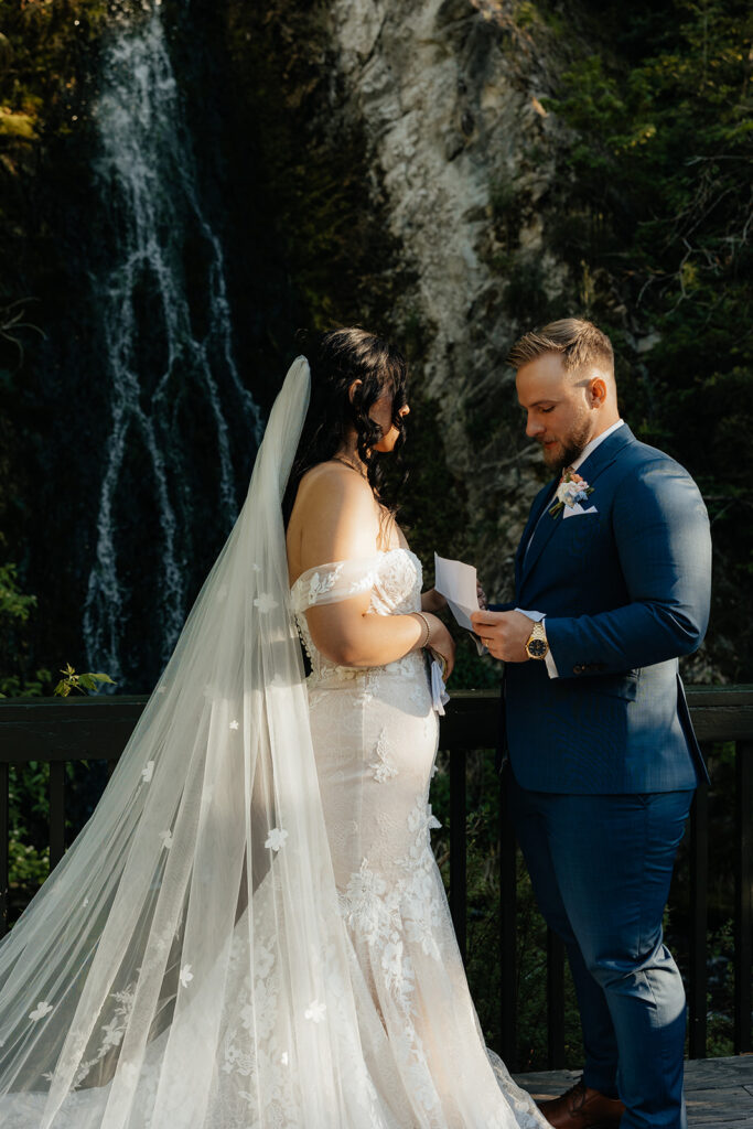 newlyweds emotional while reading their private vows