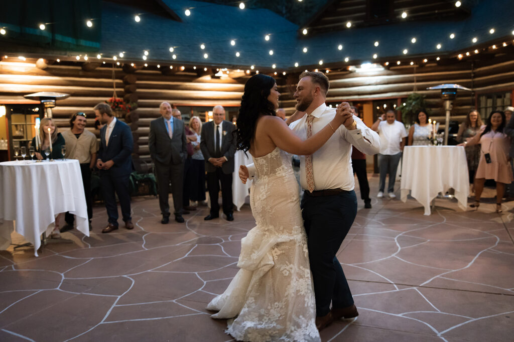 newlyweds at their first dance at their reception party