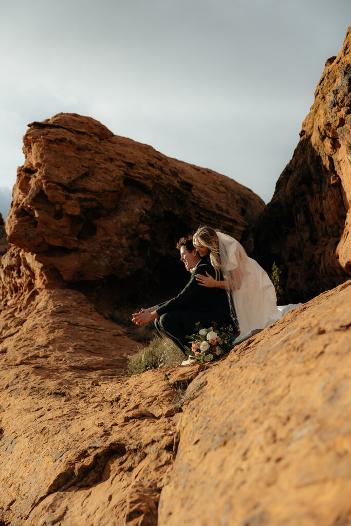 bride kissing the groom on the cheek