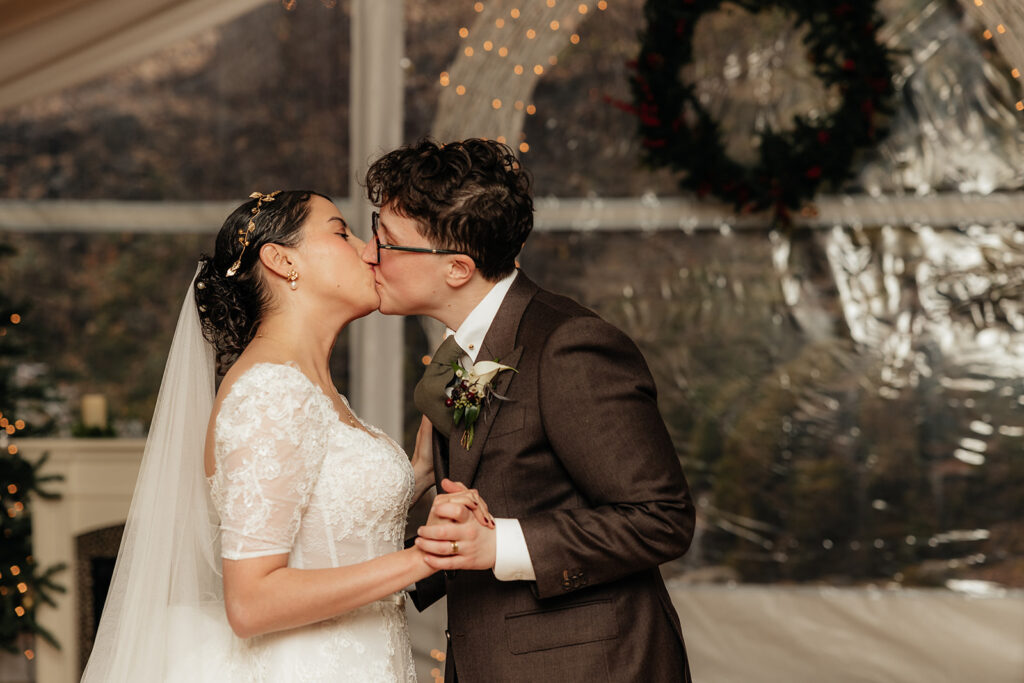 Beautiful portrait of the newly married couple kissing