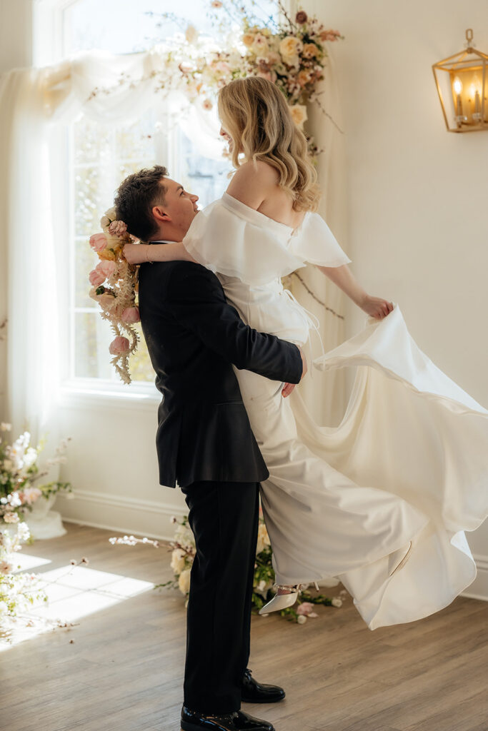 cute picture of the bride and groom at their luxurious wedding day
