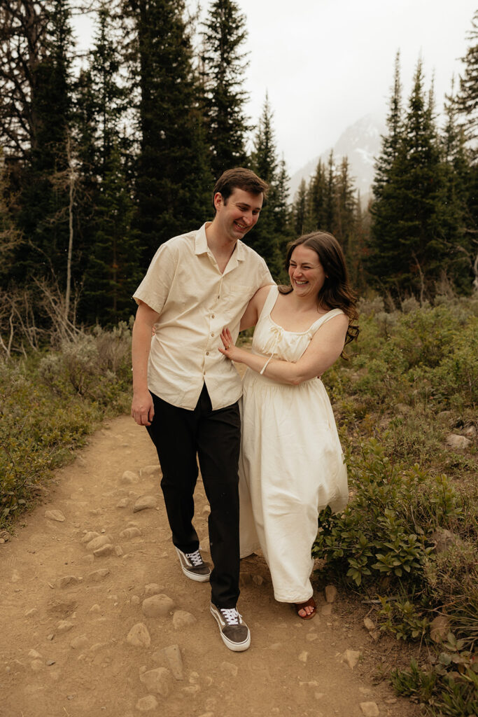 cute picture of the newly engaged couple smiling at each other