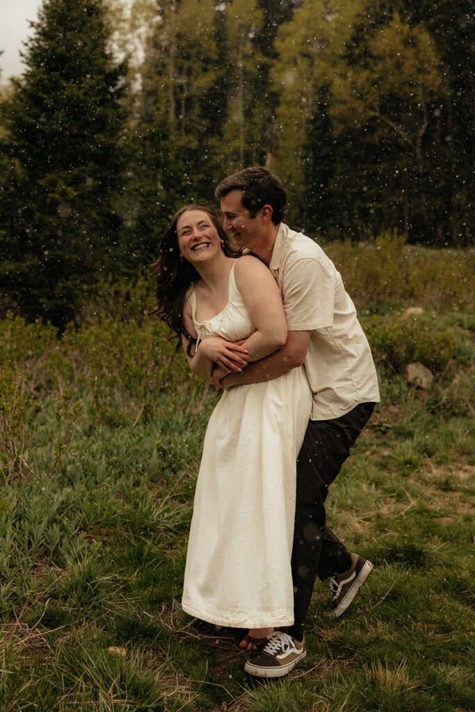 playful engagement portraits in the mountains