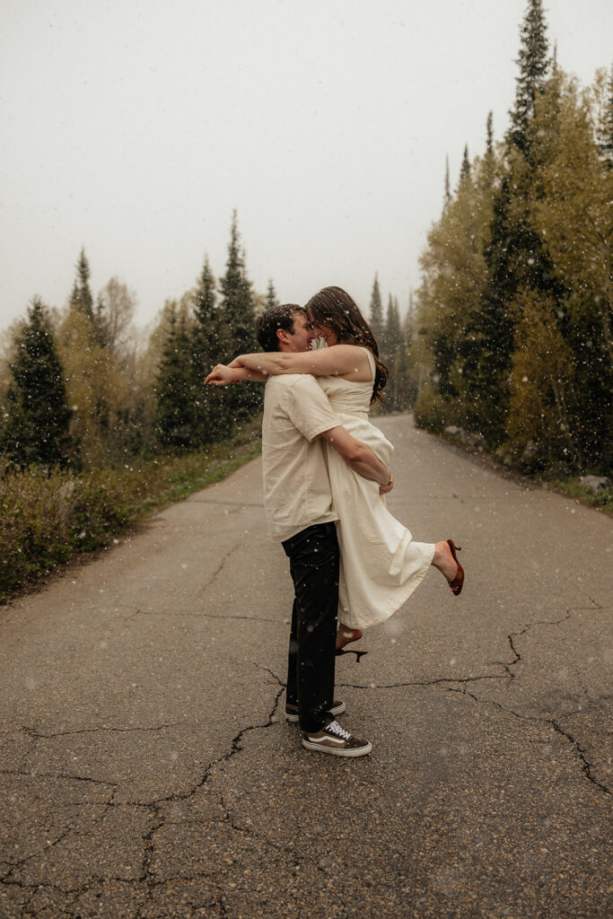 newly engaged couple kissing during their photoshoot