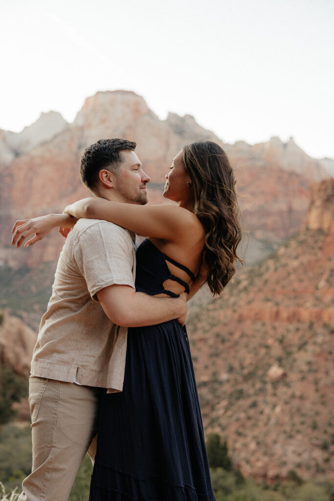 couple at their playful couple portraits in utah