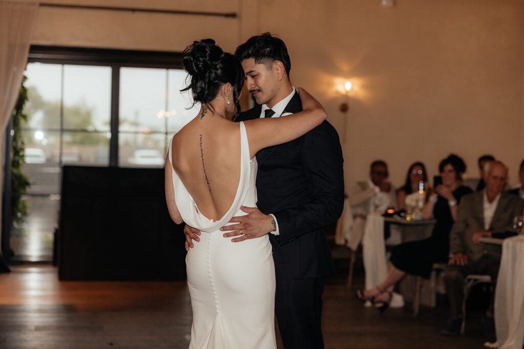 cute picture of the newlyweds at their dream wedding reception