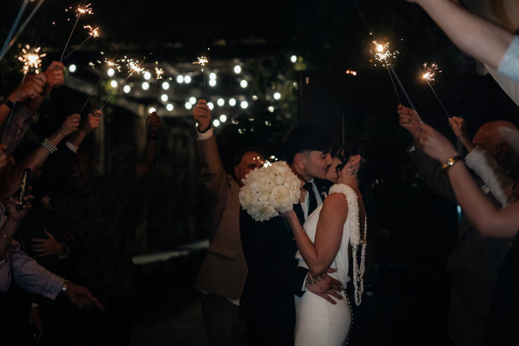 cute picture of the newlyweds kissing
